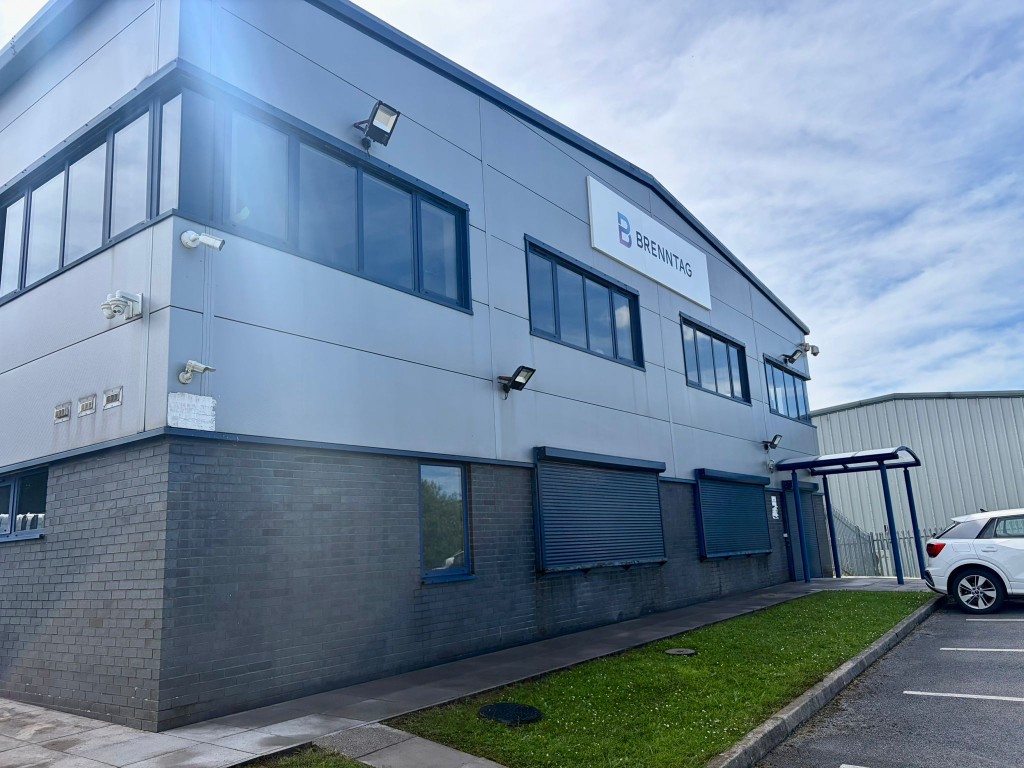 After: commercial building cladding soft washed clean of algae and dirt