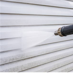 Pressure washing white exterior cladding
